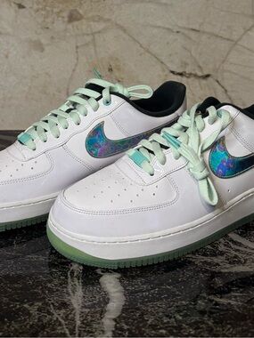 Nike White Sneakers with Mint Green Accents and Iridescent Swoosh